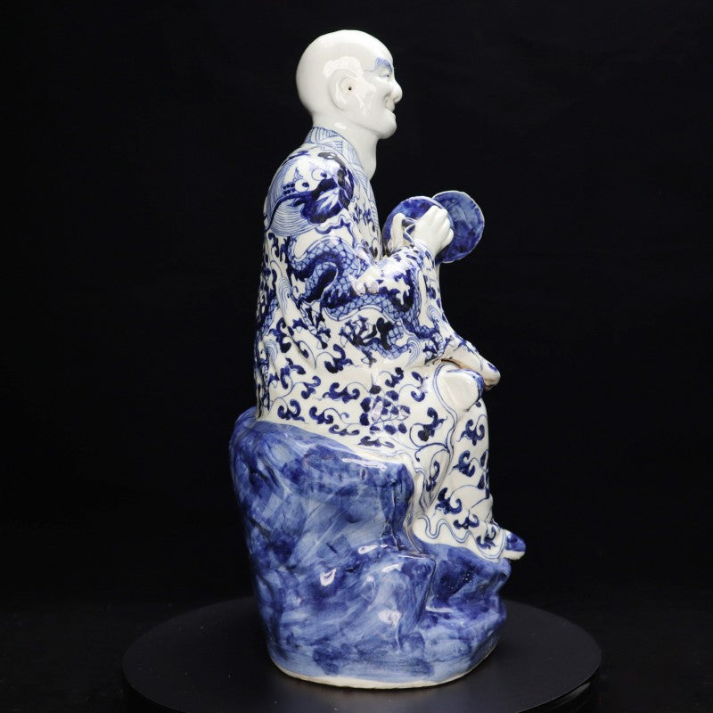 Ming Xuande Blue and Porcelain – Alms Bowl Arhat Figurine | 大明宣德青花瓷 – 舉缽羅漢擺件・私藏